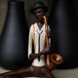 Shelf Sitting Saxophonist Sculpture