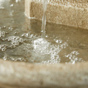 Running water in the Traditional stone-effect garden fountain